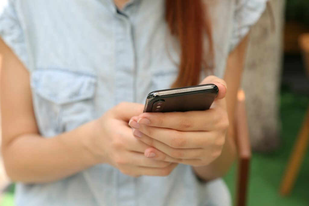 woman using mobile phone